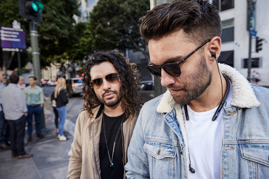 Klipsch T5 earphones worn in an urban setting